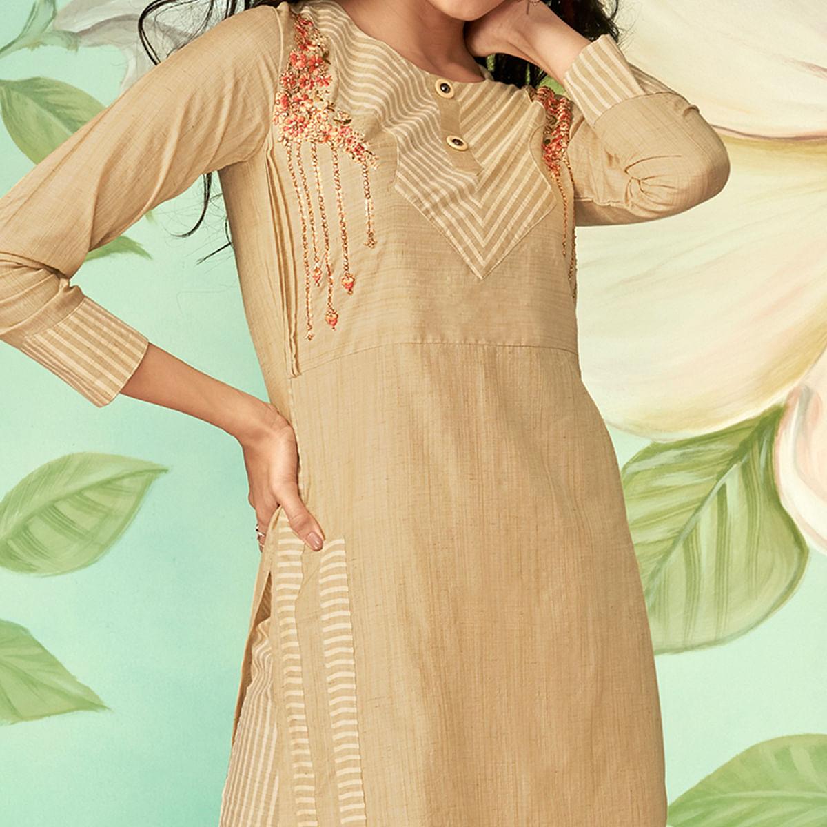 pretty beige colored party wear embroidered cotton silk kurti pant set peachmode 3